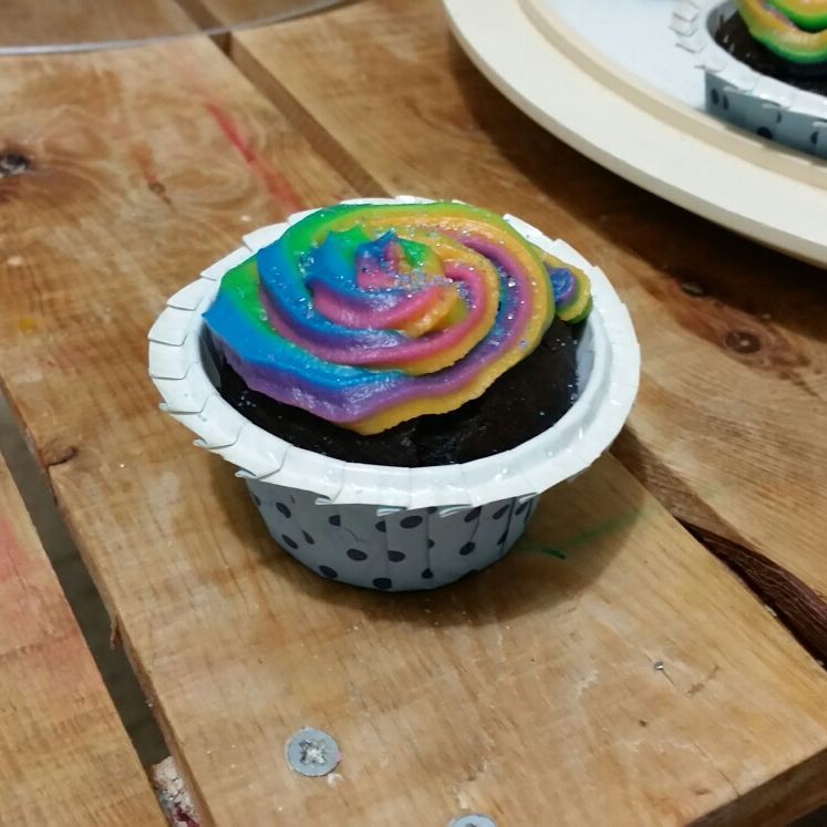 chocolate cupcake with rainbow frosting